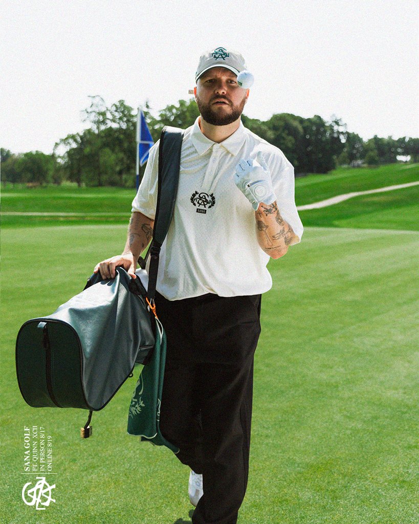 Walking the fairway with the green SANA bag and towel