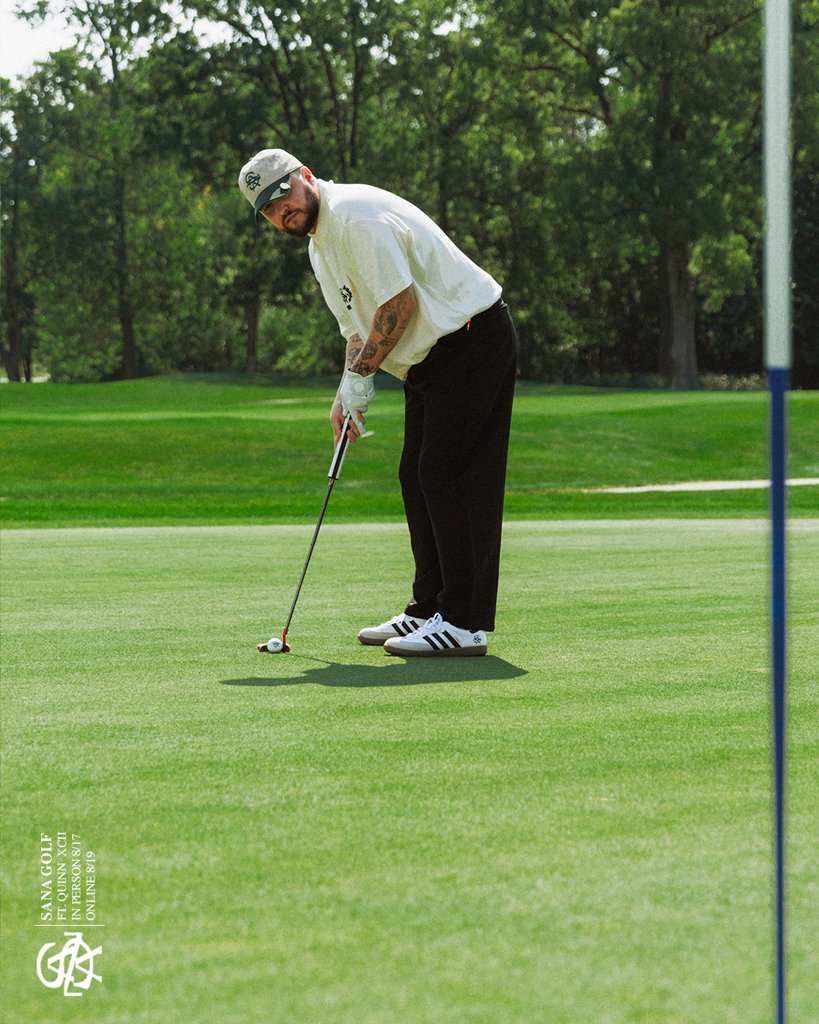 Lining up a putt in the SANA crest polo